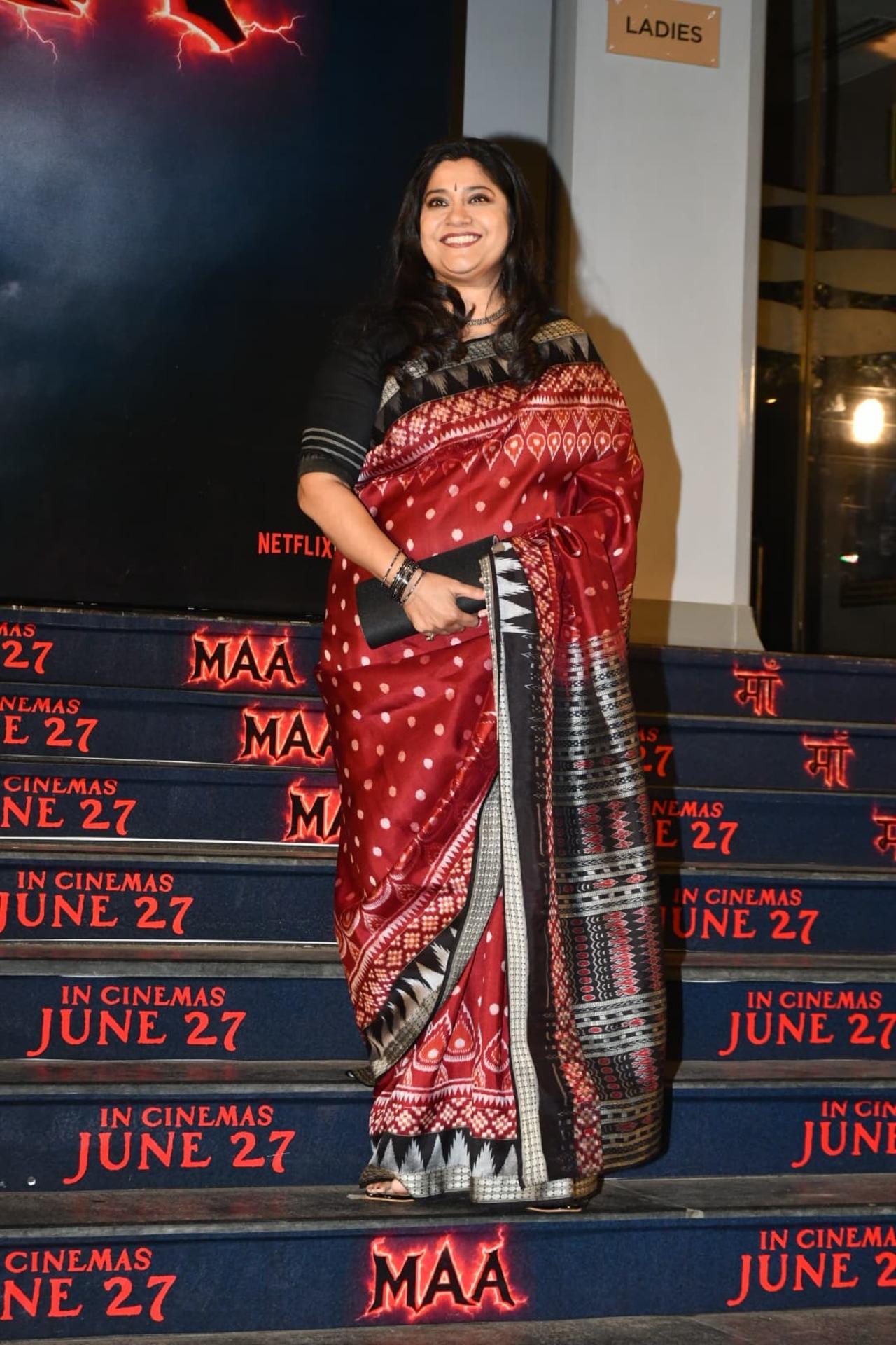Renuka Shahane looks gorgeous in a red saree wearing a beautiful smile for the screening of the horror drama